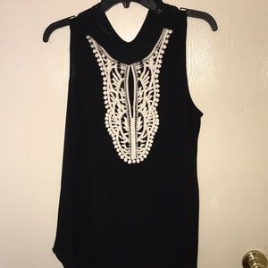 Very cute sleeveless blouse like new